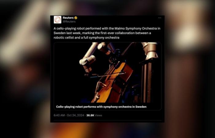 Un robot toca el violonchelo junto a una orquesta sinfónica