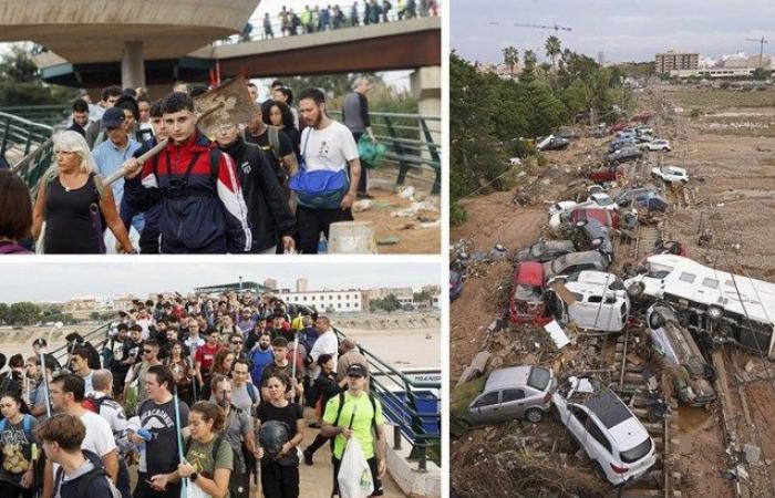 Cientos de voluntarios caminan kilómetros desde Valencia hasta las zonas más afectadas armados con cepillos y cubos