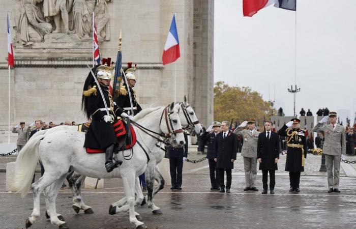 Emmanuel Macron y el primer ministro británico conmemoran el armisticio en los Campos Elíseos