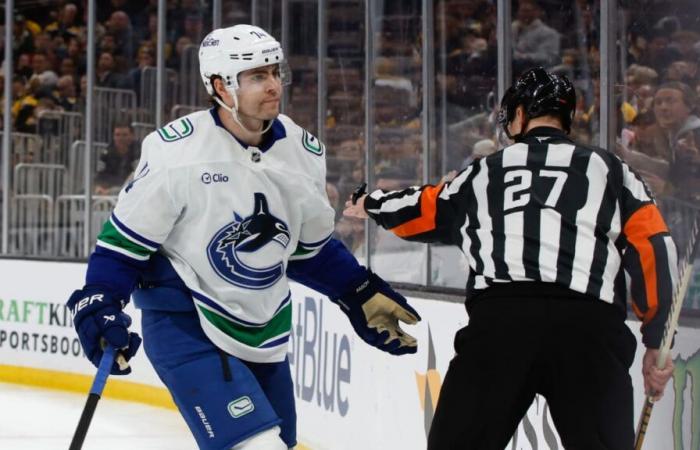 Los Canucks ganan para DeBrusk y Lankinen