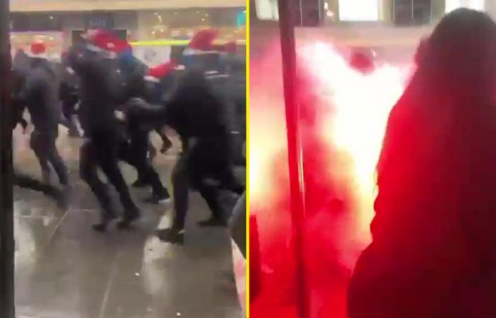 Los aficionados de los Rangers y del Celtic dejan aterrorizados a los lugareños mientras se enfrentan en el centro de la ciudad de Glasgow antes de la final de la Copa de la Liga de Escocia.