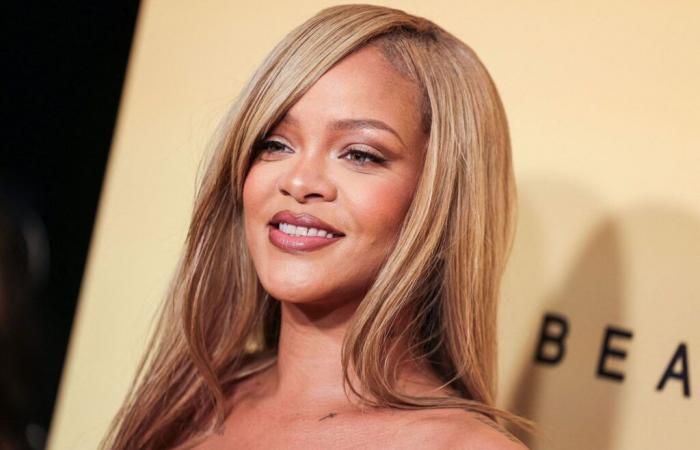 Rihanna: en pleno concierto, Mariah Carey firma su autógrafo en el pecho