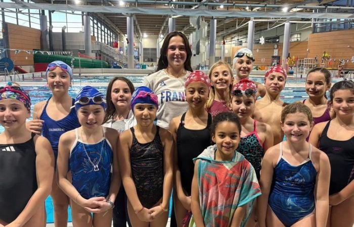 Colomieros. Dos nadadores del equipo francés al borde de las piscinas.